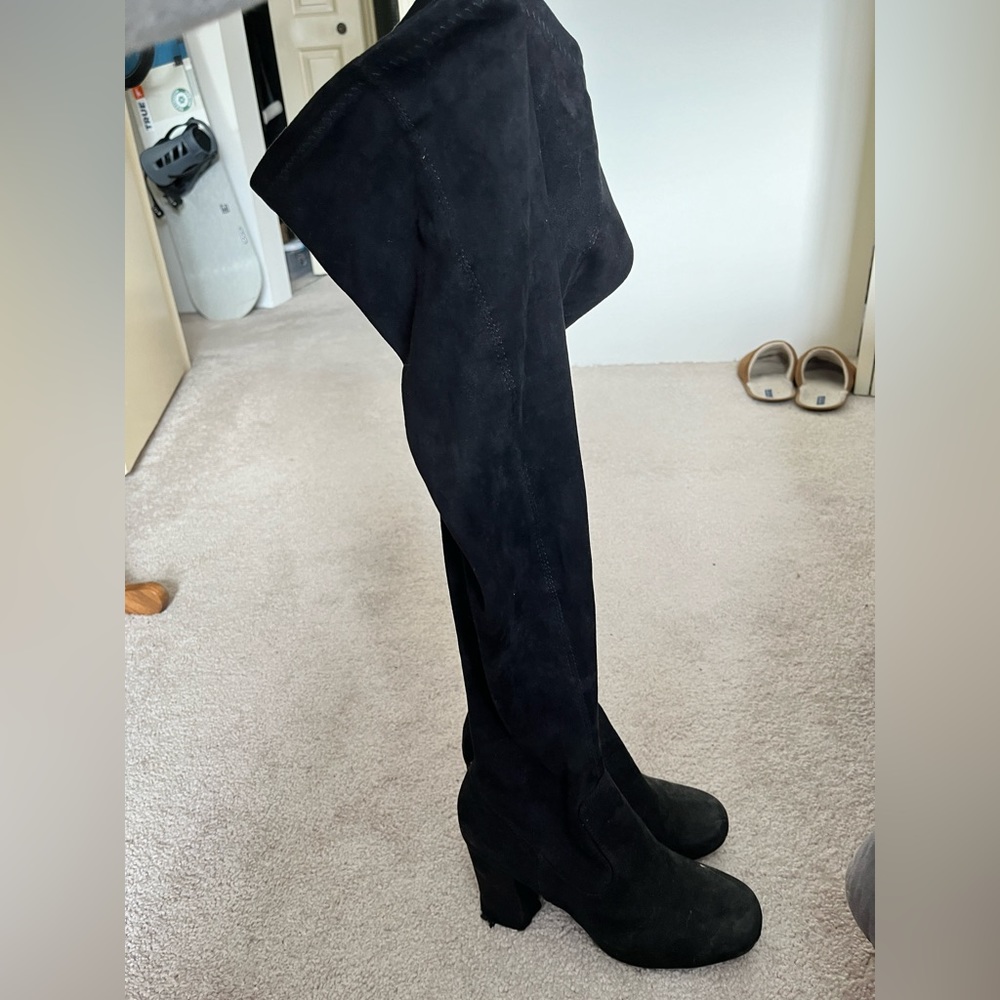 Thigh high black boots